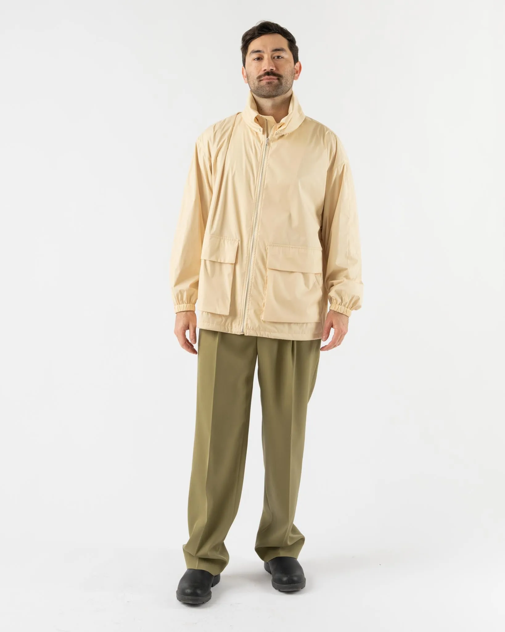 Auralee Hard Twist Polyester Satin Laminate Zip Blouson in Light Beige