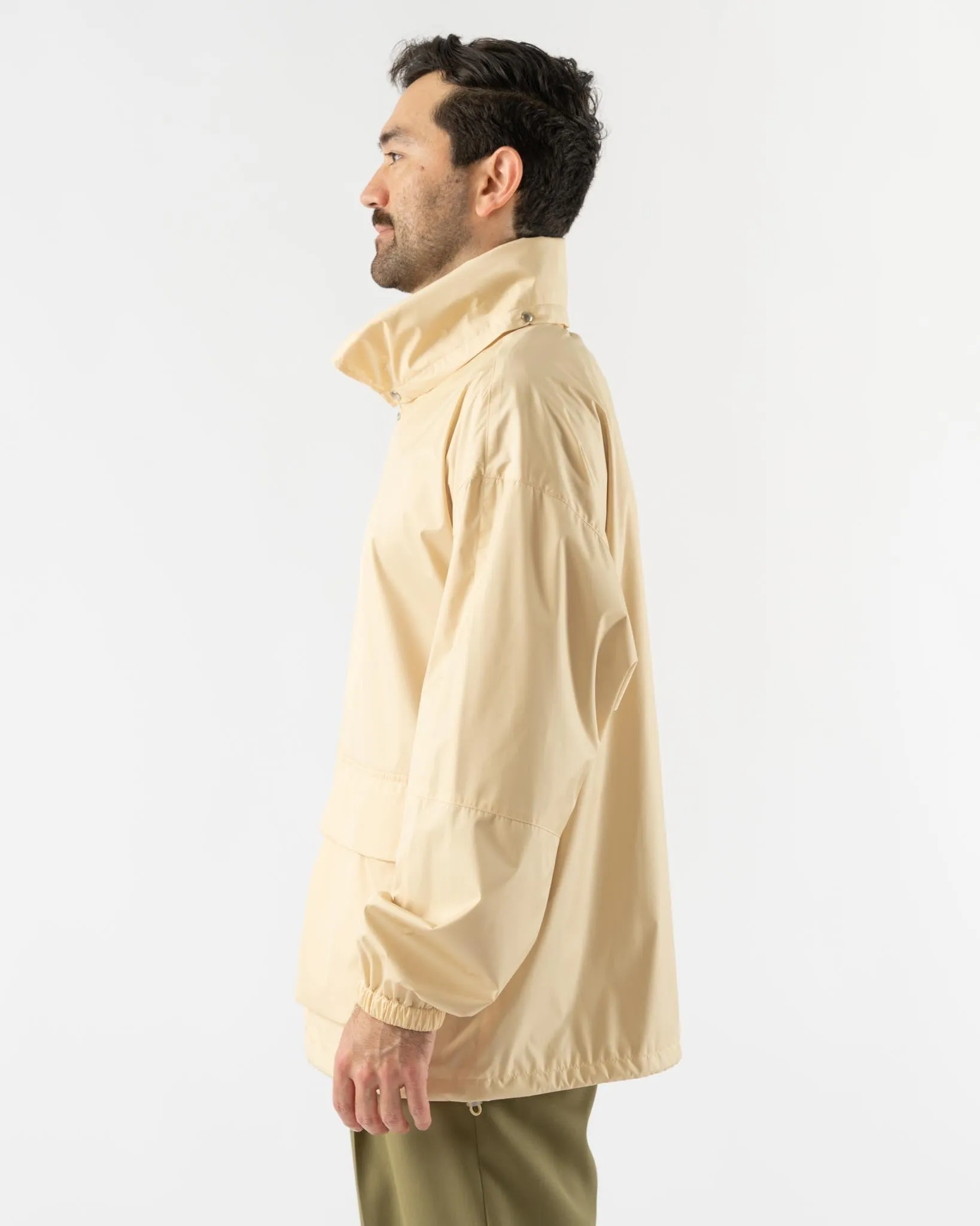 Auralee Hard Twist Polyester Satin Laminate Zip Blouson in Light Beige